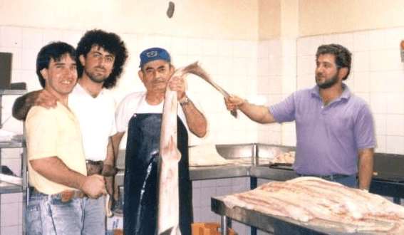 Greg & Haris Stamboulidis & Nick Athanasopoulous filleting fresh fish